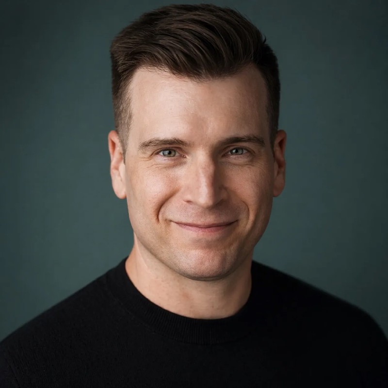 Josh Lane, photographed against a muted green background